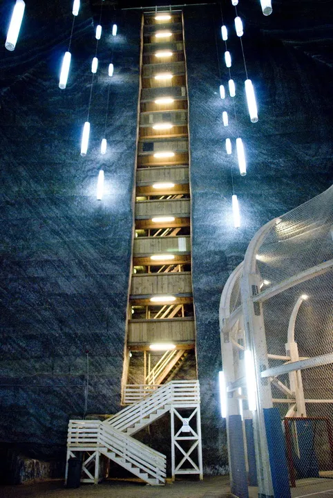 The illuminated underground halls of Salina Turda